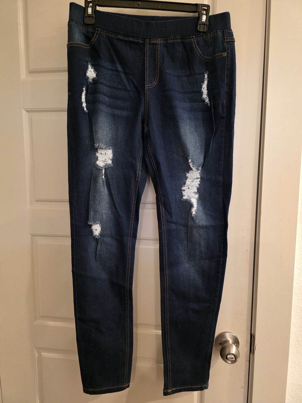 Women’s Dark Blue Distressed Jeggings
